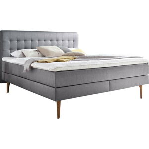 Světle šedá čalouněná dvoulůžková postel s matrací Meise Möbel Massello, 180 x 200 cm